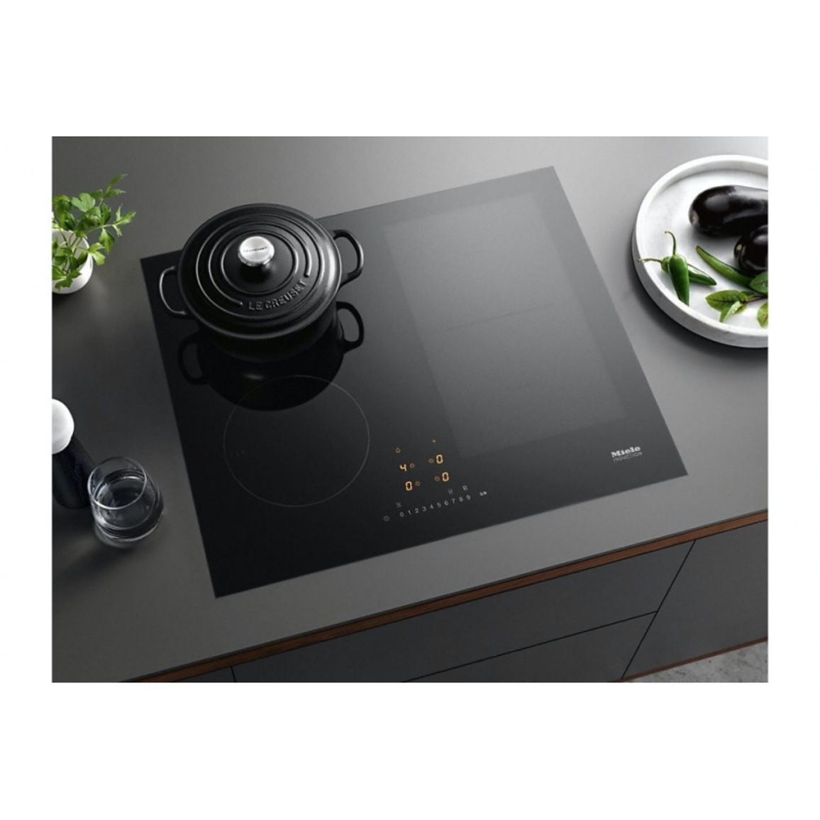 Индукционная варочная поверхность KM 7464 FR черная Miele Индукционная варочная поверхность KM 7464 FR черная Miele
