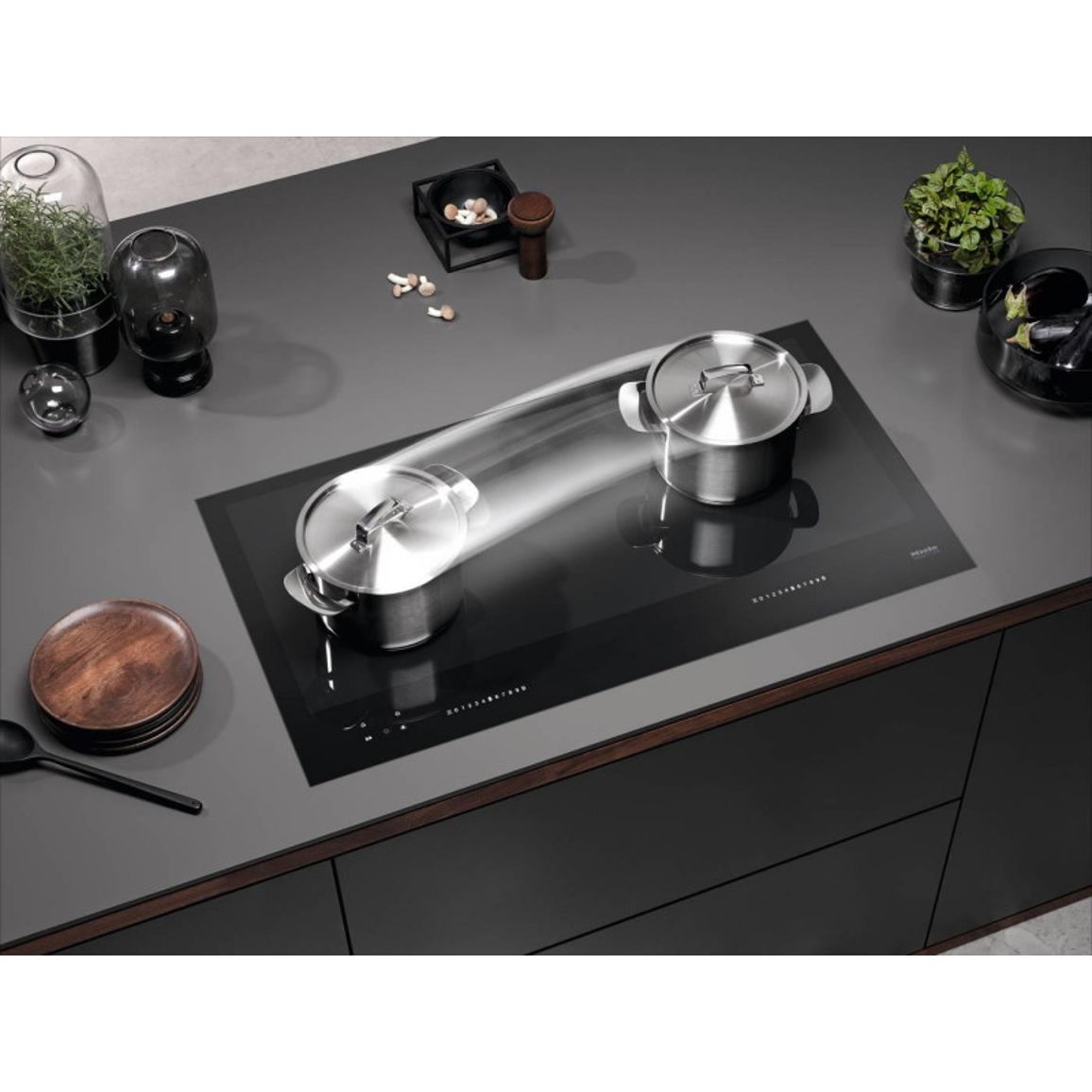 Индукционная варочная поверхность KM 7697 FR черная Miele Индукционная варочная поверхность KM 7697 FR черная Miele