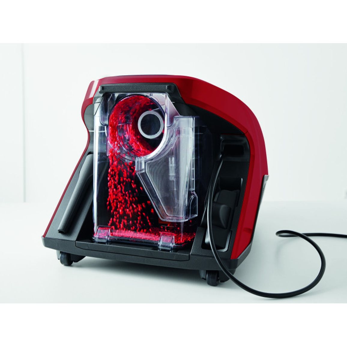 Безмешковый пылесос SKRF3 Blizzard CX1 мангово-красный Miele